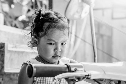 upset little girl in outdoor in vintage color tone – Version 2